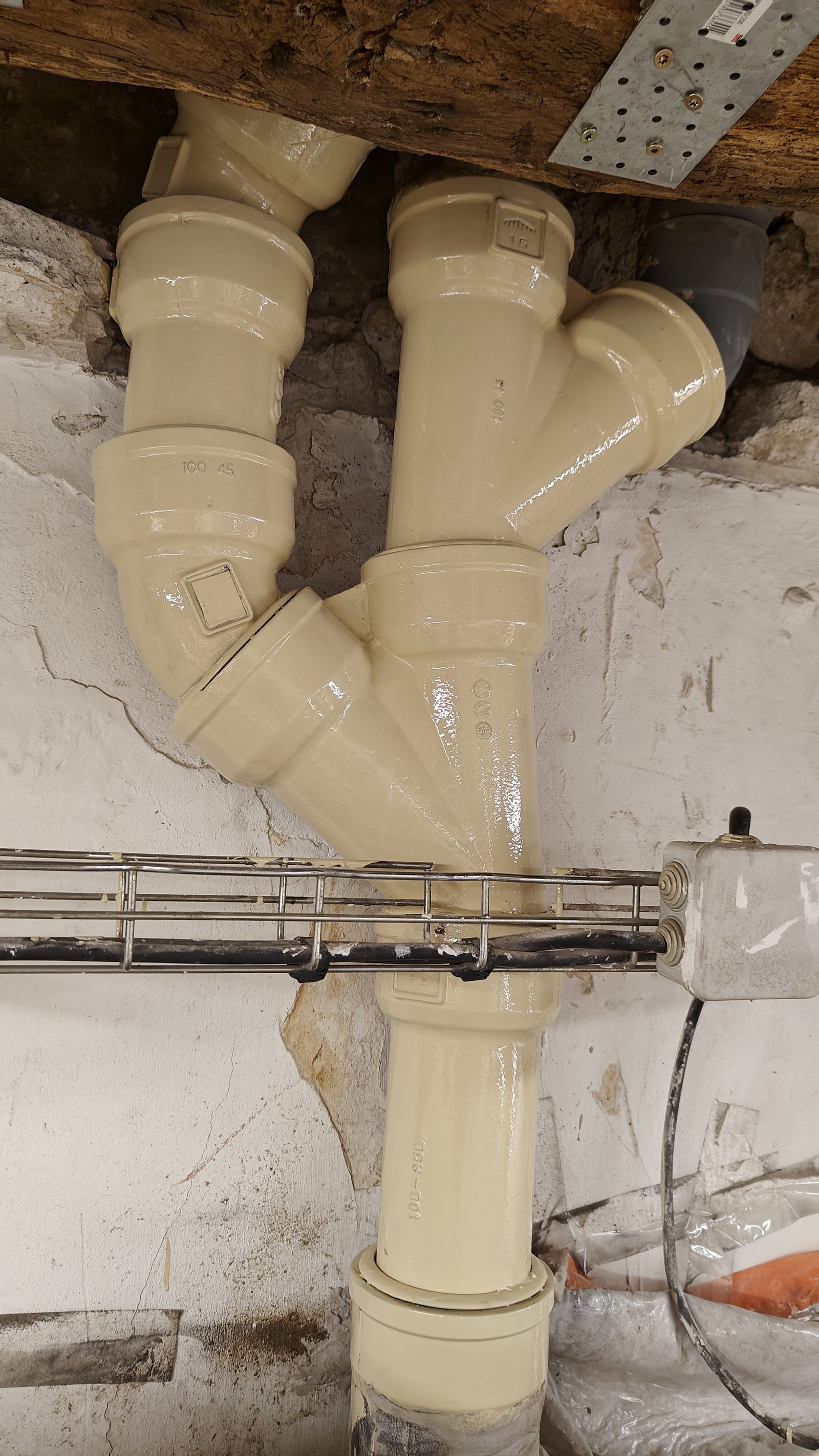 Mise en conformité jonction multi-matériaux fonte PVC plomb Paris 14